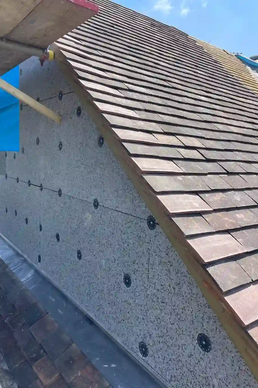 Roof retiling in progress with breathable membrane
